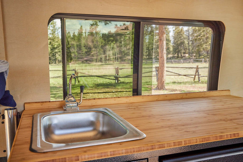  and a distant snow-capped mountain.|White camper van RV rental — photo 20