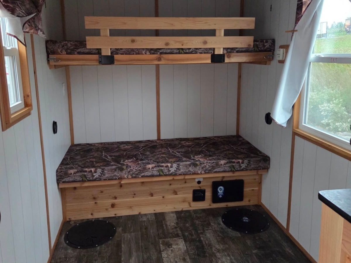  great for RV rental. This trailer is designed for cozy winter recreation.|RV rental: Rustic interior with bunk beds — photo 2