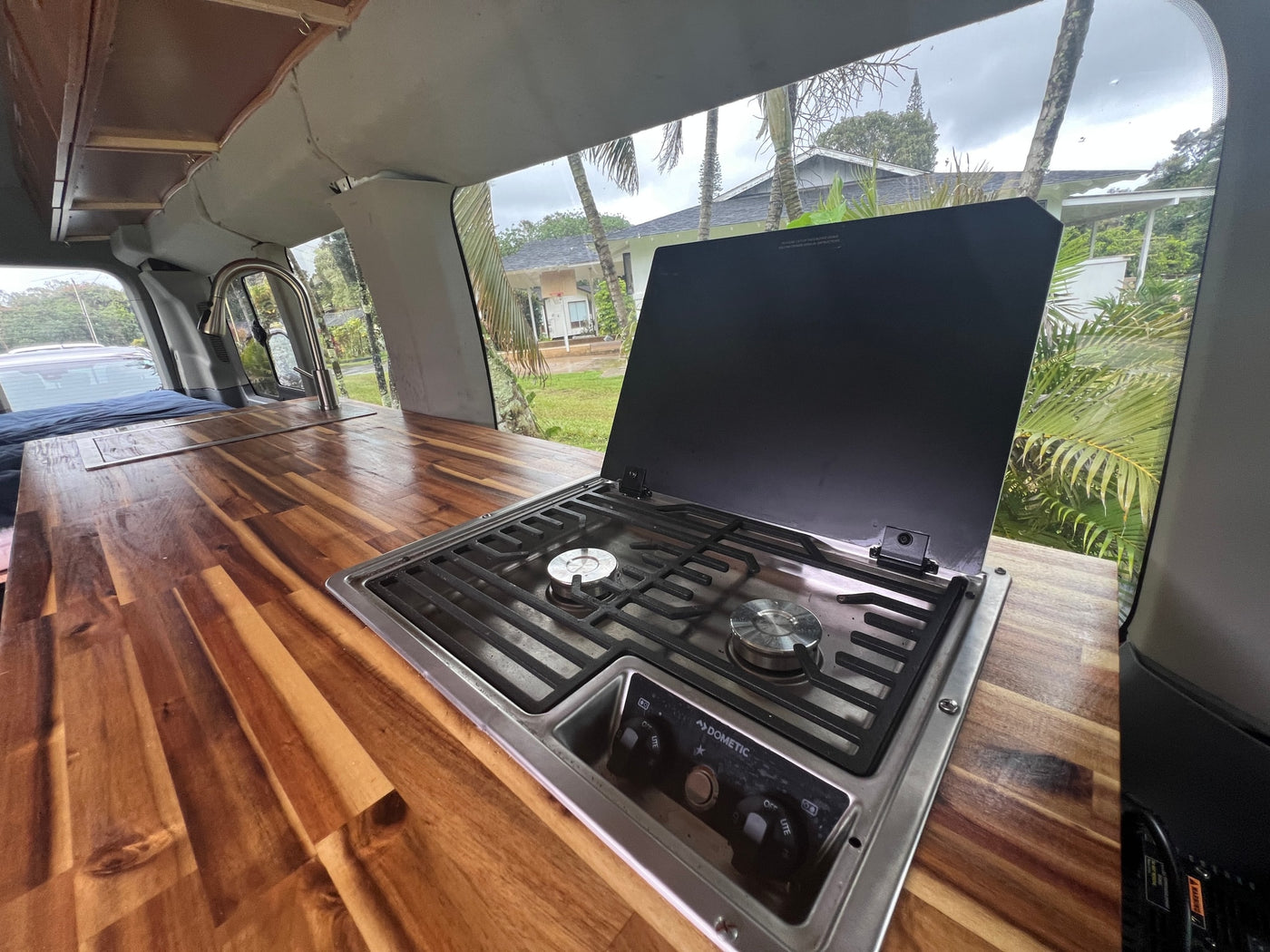  and smart storage.|Enjoy a functional RV rental kitchen! Features include a stainless steel sink — photo 10