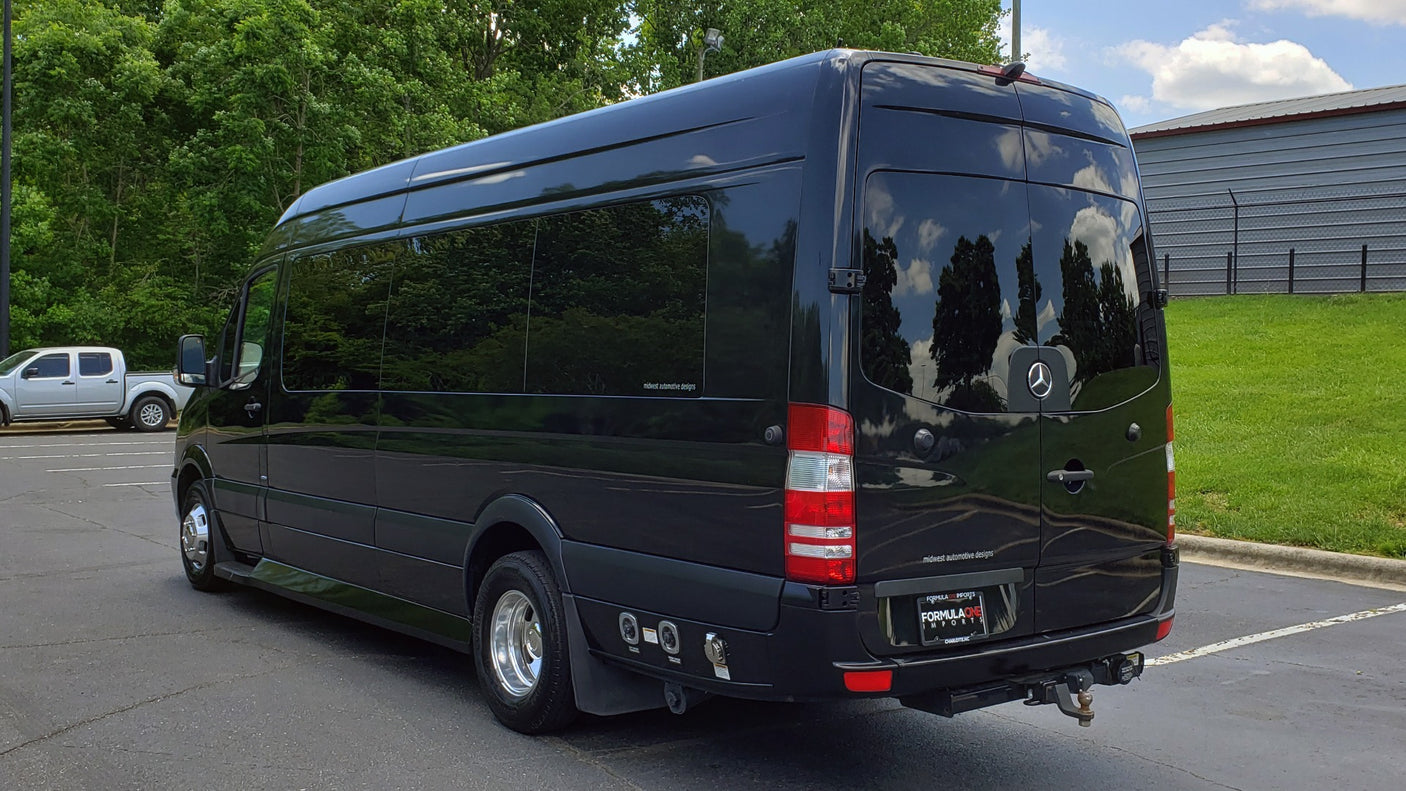This black Mercedes-Benz Sprinter luxury van is a premium rv rental, with custom features & tow hitch.
