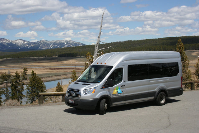 Silver WanderVans RV rental overlooks scenic mountains