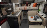 This Solis RV rental offers a compact kitchen, raised bed, and dining area, ideal for mobile living and travel adventures.