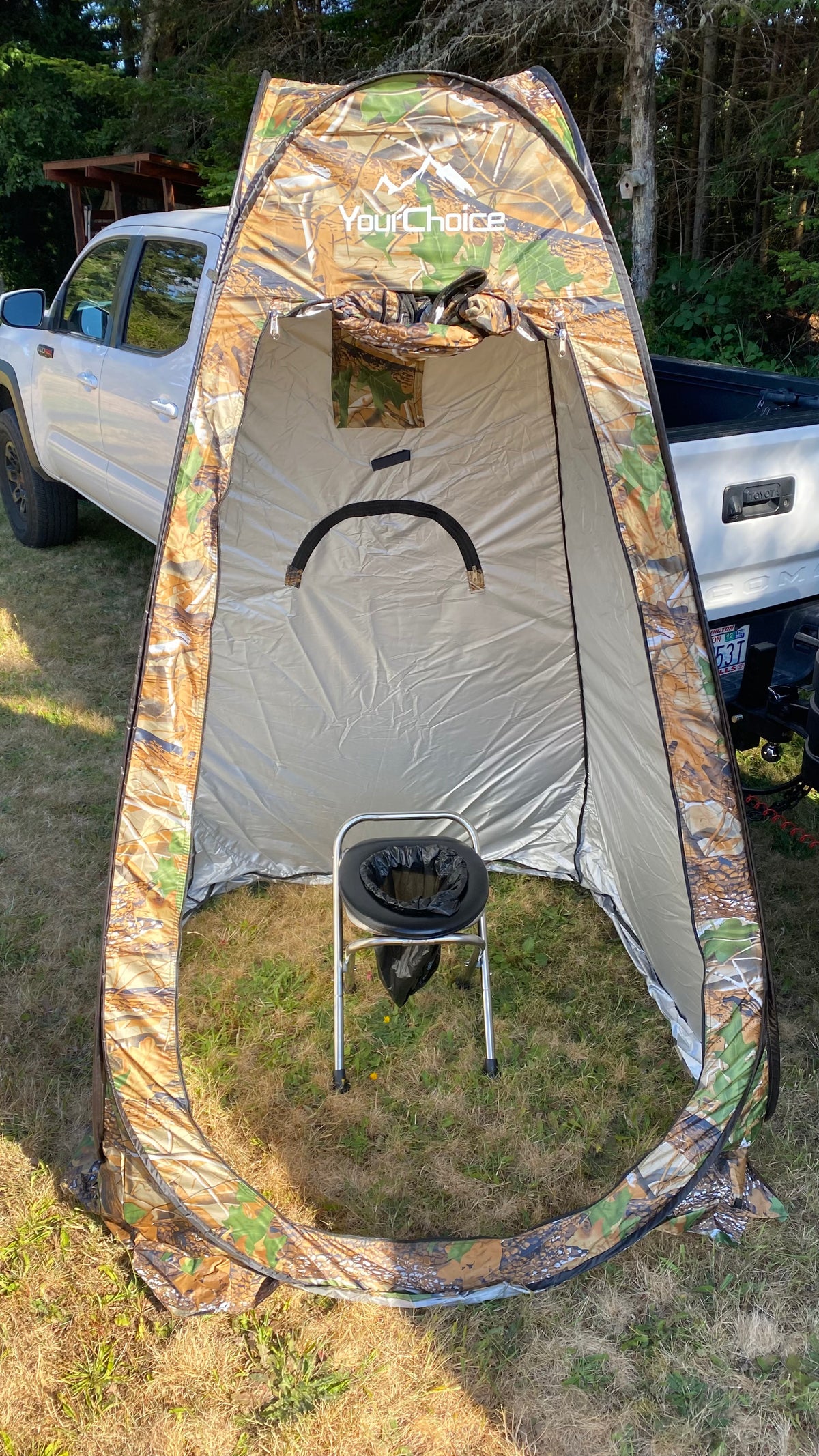 A camo privacy tent with a portable toilet inside, set up outdoors. Ideal for RV rental trips, camping, and outdoor comfort. — photo 7