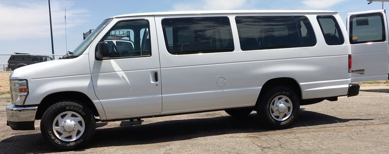  available for rv rental and your next road trip adventure.|White Ford E-350 passenger van for rv rental or large group travel — photo 2