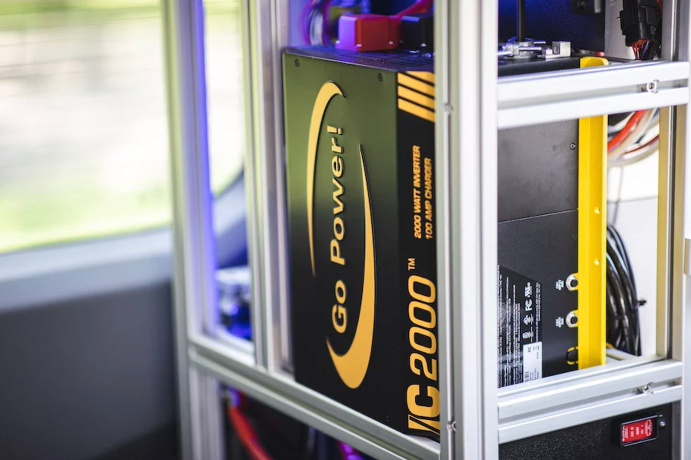 A Go Power! IC2000 inverter/charger for reliable off-grid power in an RV rental.