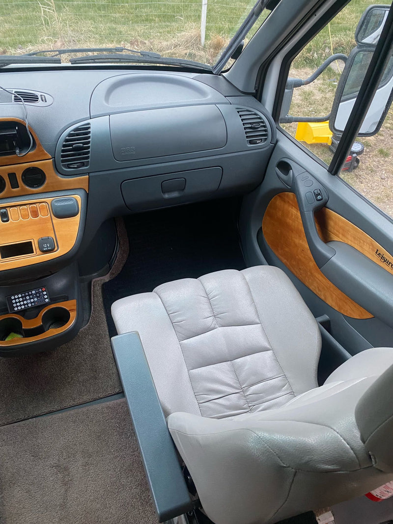  & cockpit. Great for travel.|RV rental interior: A cozy dinette setup with a plush sofa — photo 7
