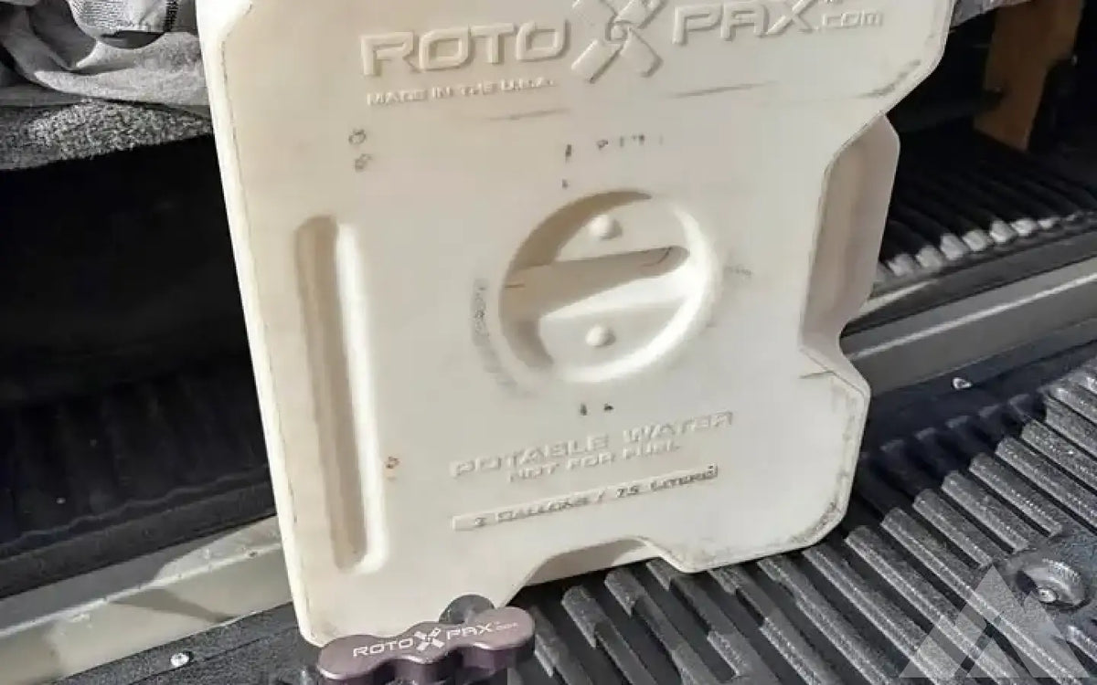 Rotopax 2gal water jug and mount — used water & fuel storage for sale
