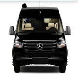 Front view of a black Mercedes-Benz Sprinter van, ideal for rv rental. Shows a luxurious interior with light-colored seats.