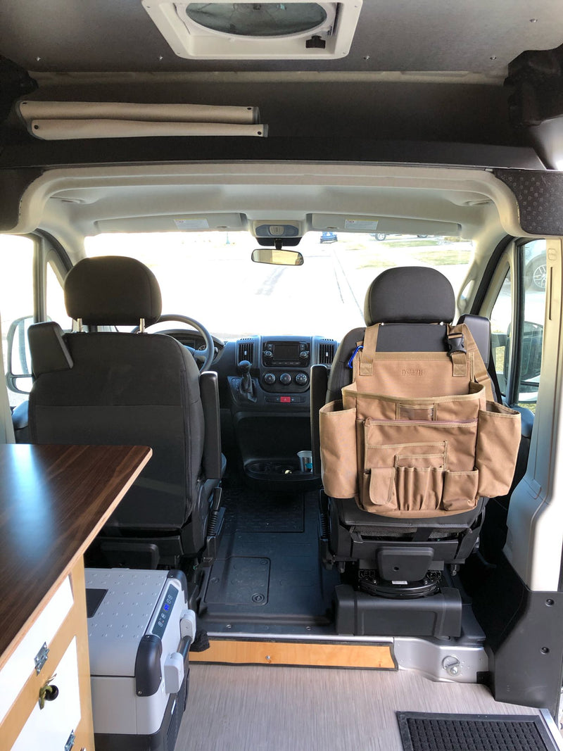  and storage.|Inside an RV rental: a flexible camper van interior with bright green cushions — photo 9