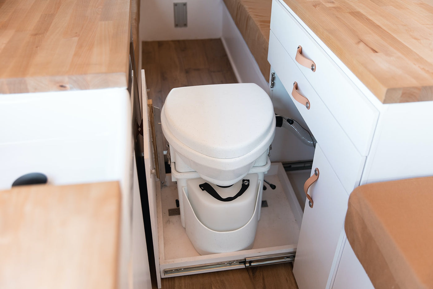 featuring convertible bench seating.|Step inside this modern RV rental! Bright interior with wood ceiling — photo 10
