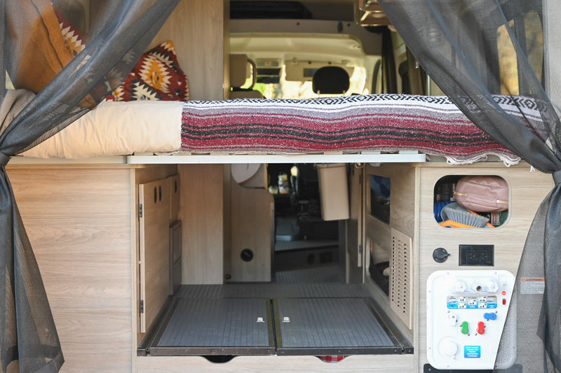  dining table & scenic mountain view. Ideal for van life adventures.|Step inside this RV rental — photo 11