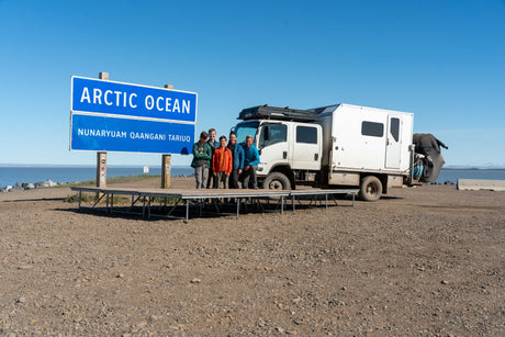 The rig at the Arctic Ocean sign in Tuktoyaktuk
