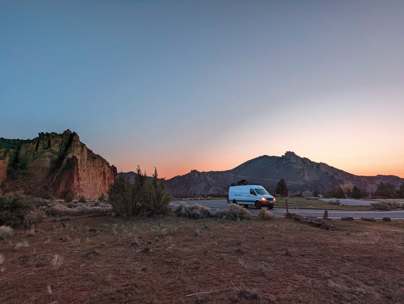  vibrant pink and orange sky. Adventure awaits!|White camper van — photo 18