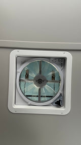 A white Maxxair fan/vent, an essential feature inside this RV rental for ventilation and comfort.