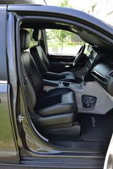 Inside a rental minivan: comfortable front seats, console, and dash. Great for travel; ask about RV rental!