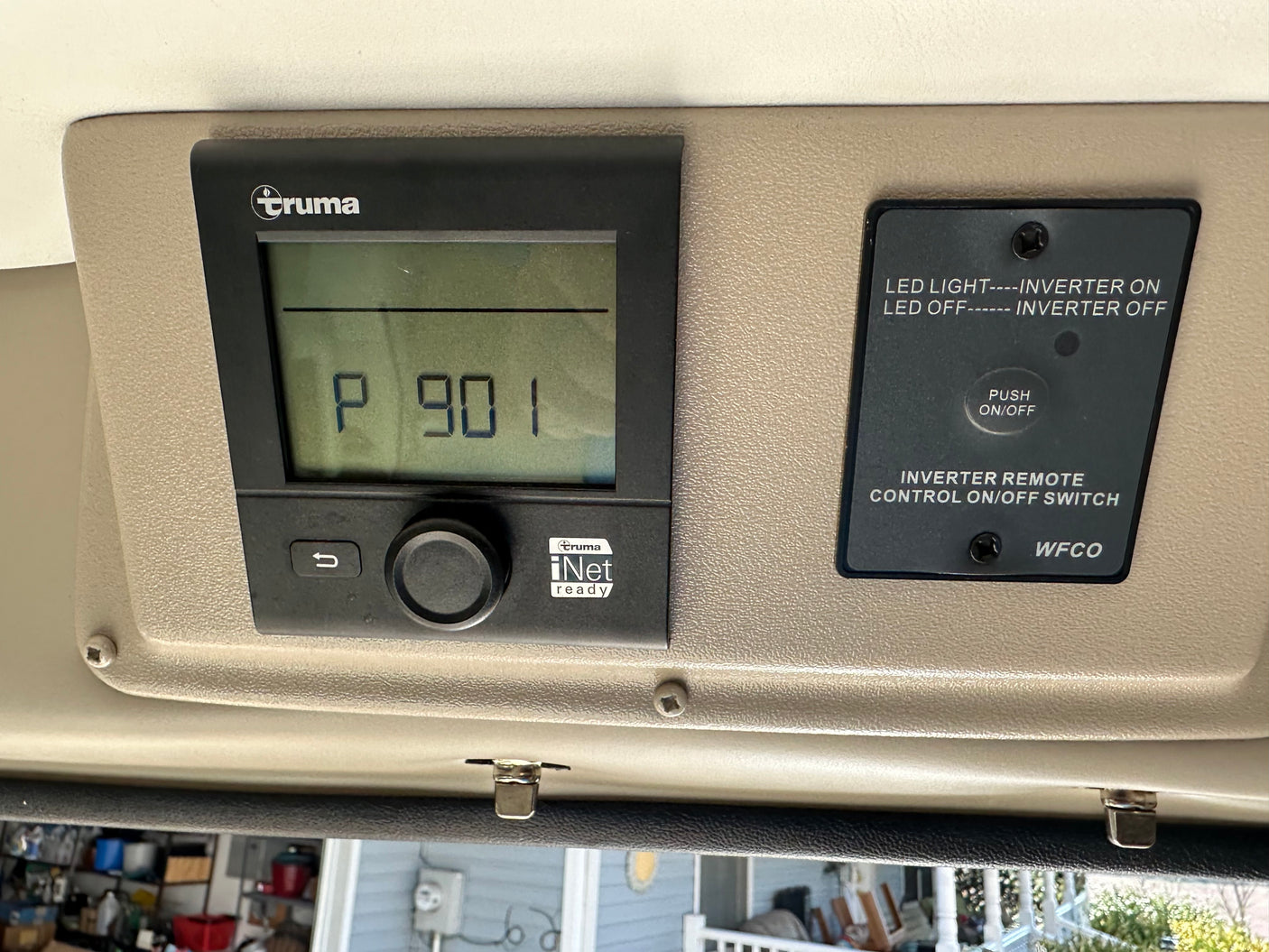 RV rental interior: Truma control panel displays "P 901" alongside a WFCO inverter remote ON/OFF switch.
