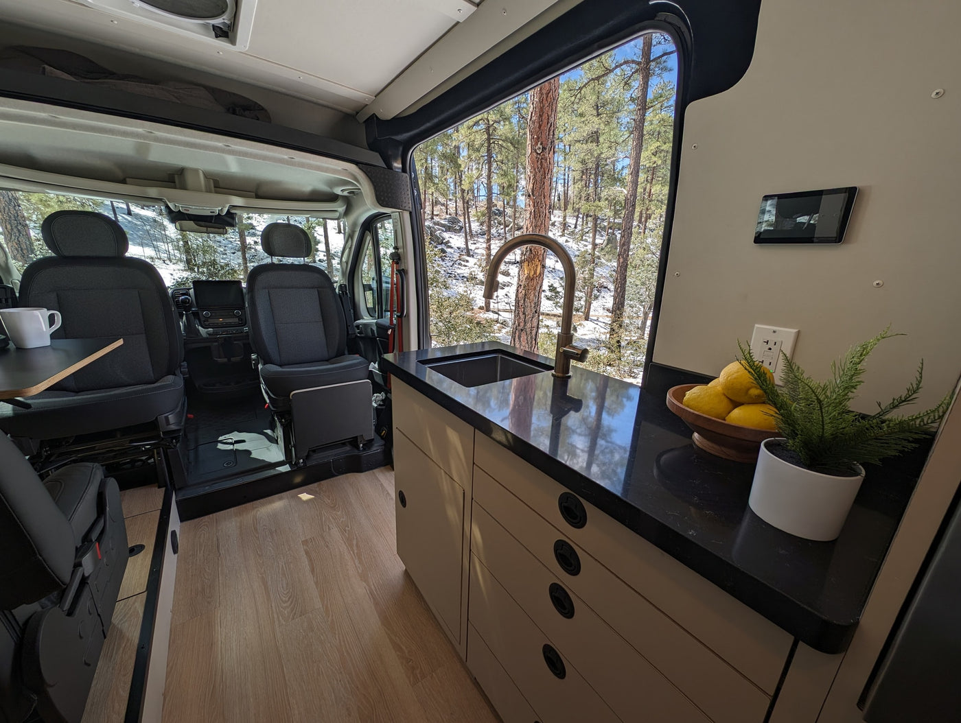  and scenic views from the large windows.|RV rental interior: modern kitchenette with sink — photo 6