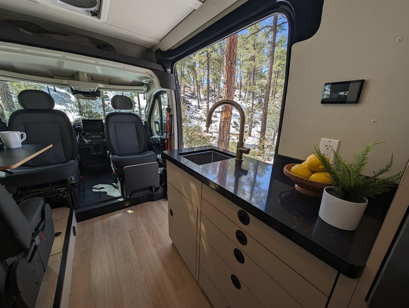  and scenic views from the large windows.|RV rental interior: modern kitchenette with sink — photo 6