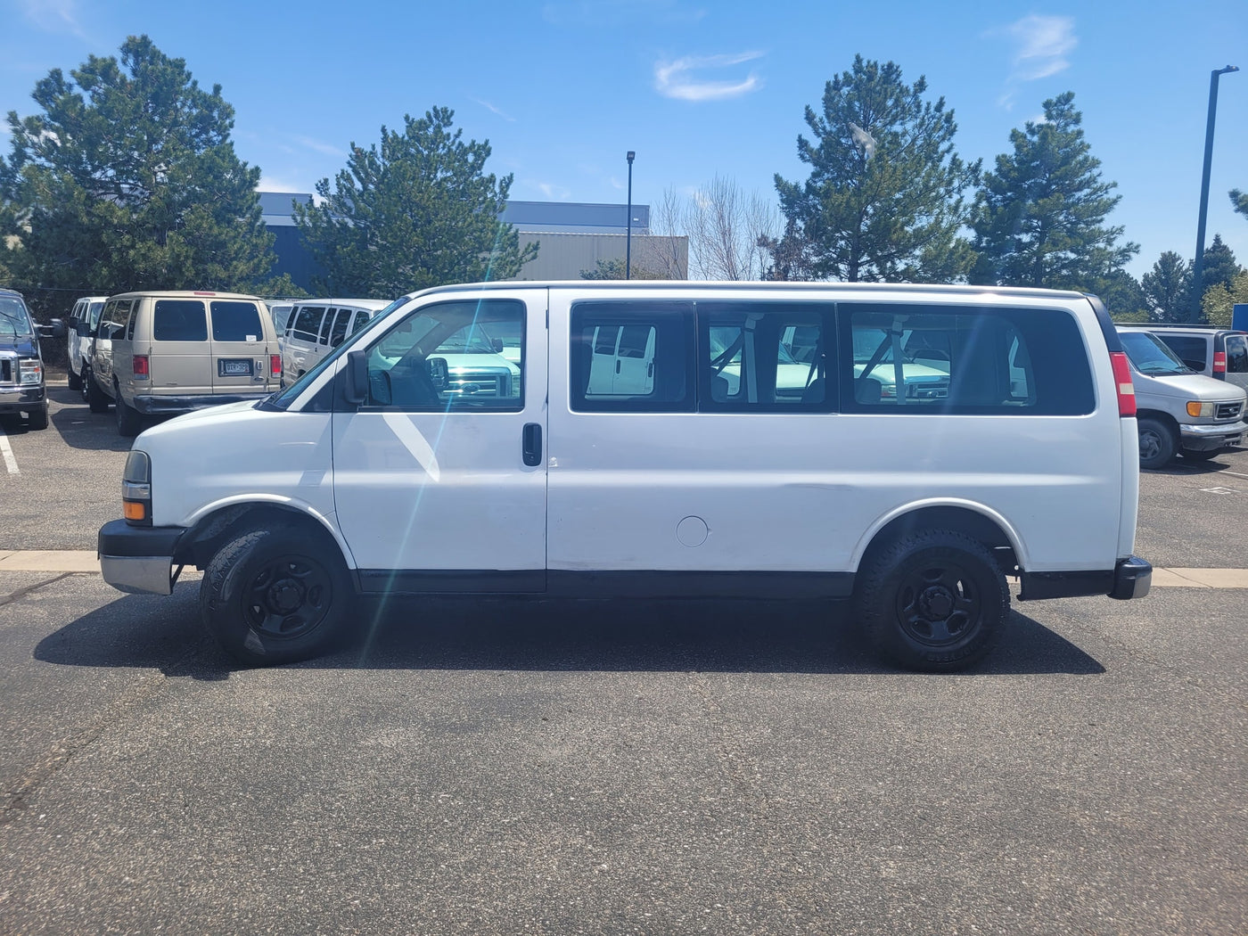  with other vans and RVs in the background — photo 2