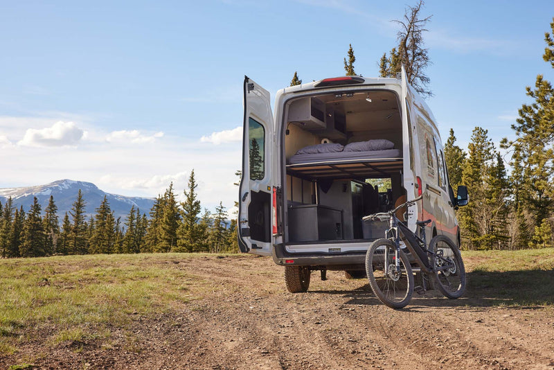  perfect for your next rv rental adventure.|This RV rental camper van is ready for adventure with a mountain bike — photo 5