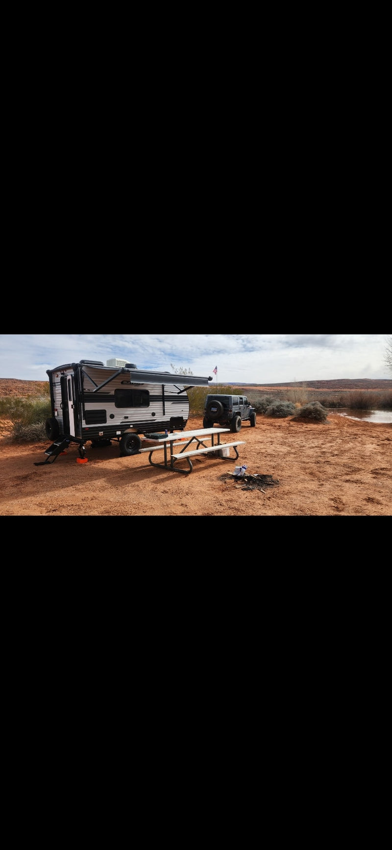  with solar charger display.|Compact shower in an RV rental — photo 12