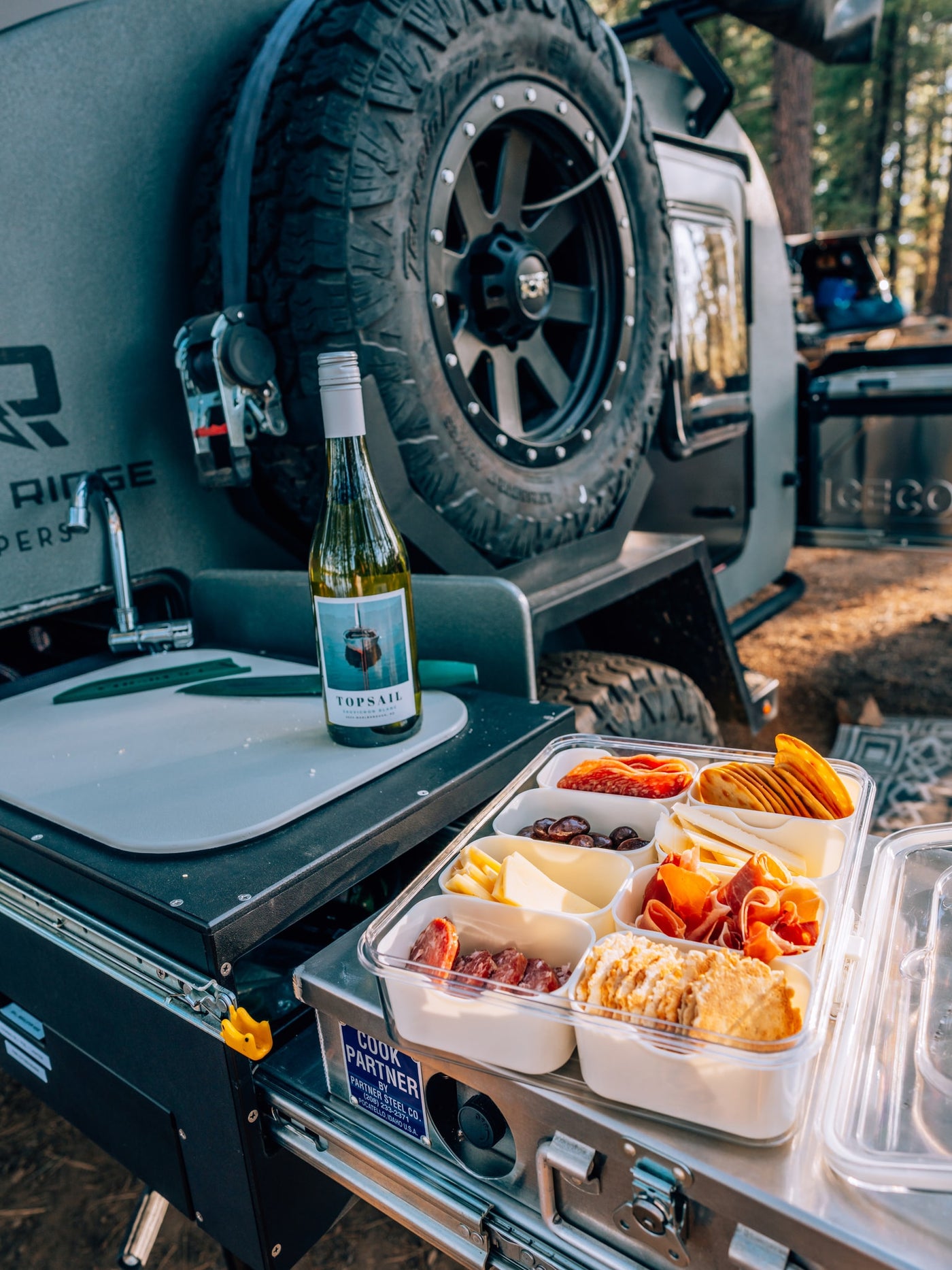 RV rental outdoor kitchen: wine, charcuterie, & a 'COOK PARTNER' unit for gourmet camp meals. — photo 10