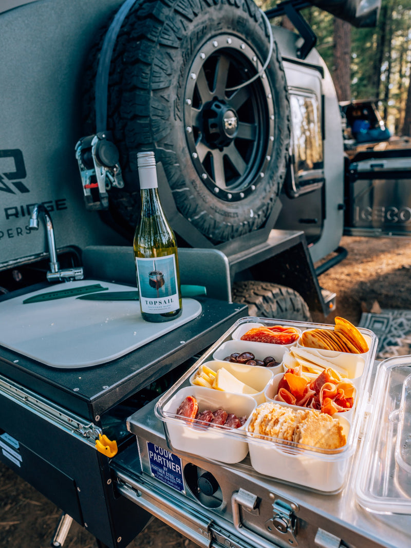 RV rental outdoor kitchen: wine, charcuterie, & a 'COOK PARTNER' unit for gourmet camp meals. — photo 10