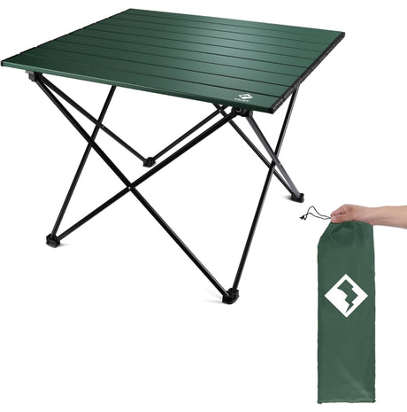 A dark green portable camping table with its carry bag, ideal gear for your RV rental trips.