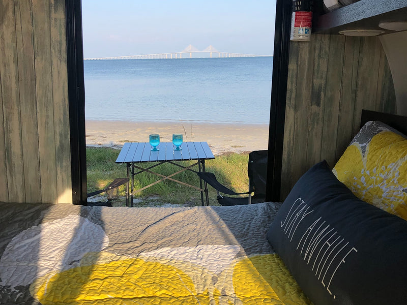 **RV rental** offers a serene beach view of the Sunshine Skyway Bridge & gulf. Relax by the water from your camper! — photo 11