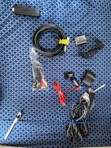 Packing for your RV rental? Essential tech includes Amazon Fire Stick, coaxial/power/AV cables, and car/wall chargers.
