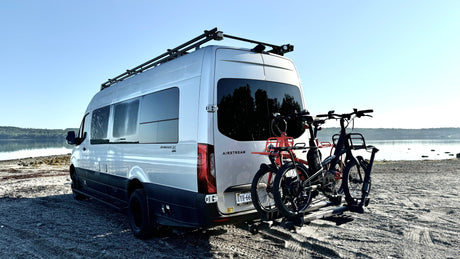 Discover nature's beauty with this Airstream RV rental, bikes ready for lakeside adventures.