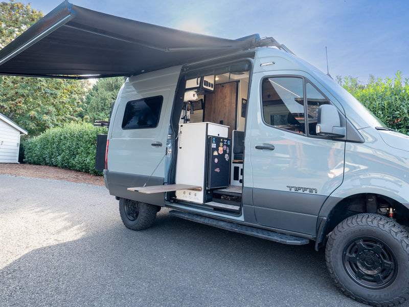  and rear gear rack with accessories.|Front view of a powerful Mercedes Sprinter adventure van — photo 10