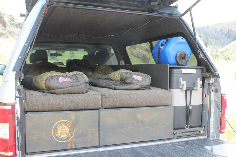  showing interior controls & center console.|This F-150 truck camper with a rooftop tent — photo 23