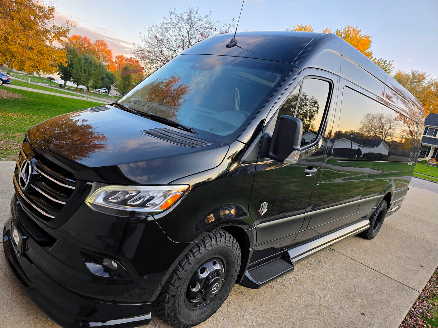Sleek black Mercedes Sprinter camper van, equipped for adventure. An ideal RV rental for your next journey.
