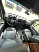 Modern Mercedes-Benz rv rental interior. Features include a sleek dashboard and comfortable captain's chairs.