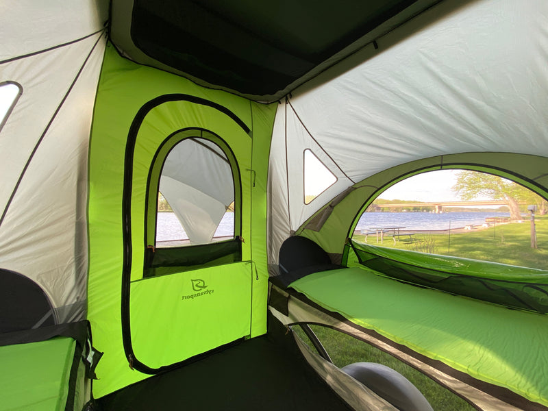 Bright SylvanSport tent interior with comfy pads and serene lake view. Ideal for your RV rental adventure. — photo 13