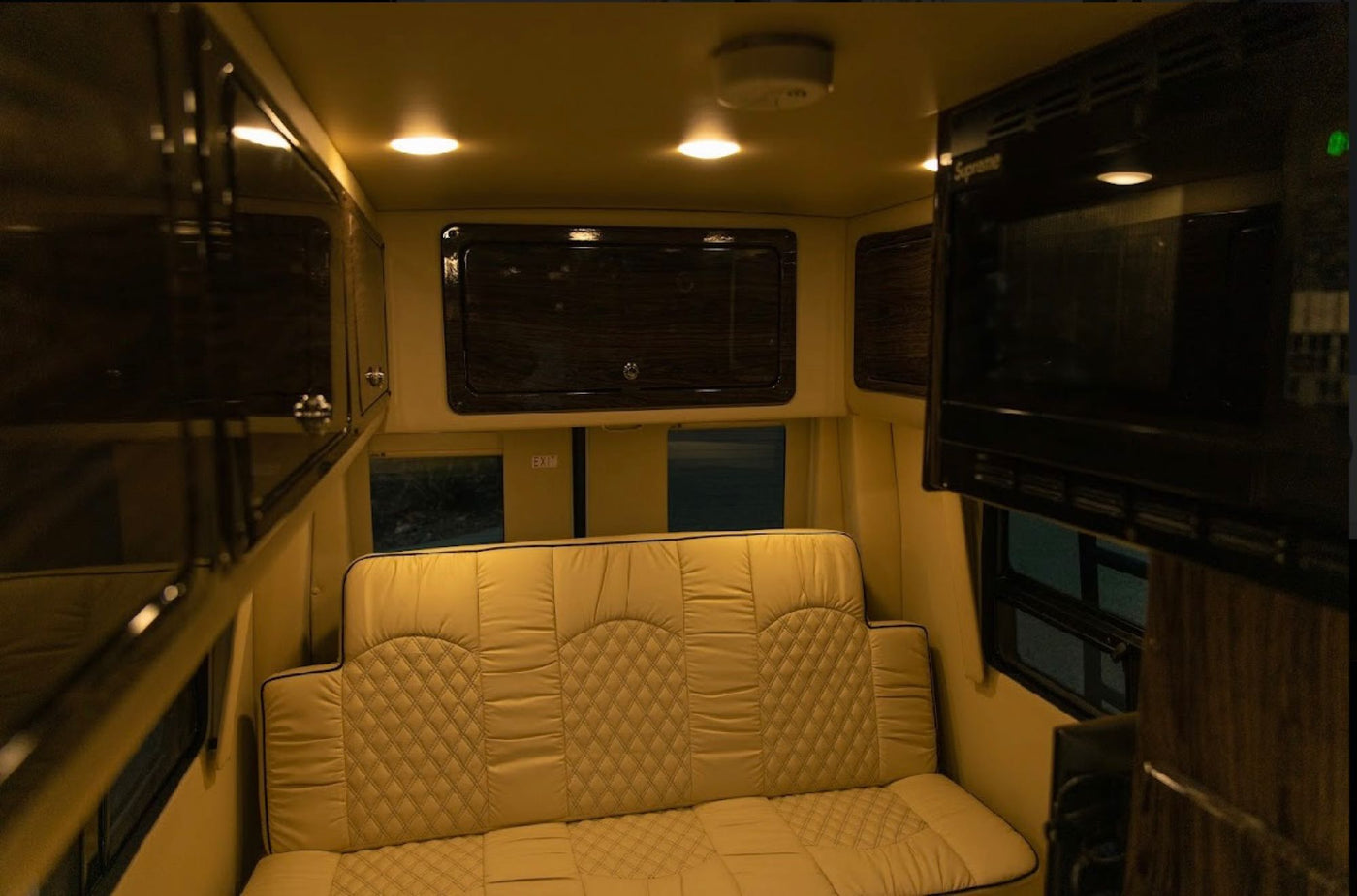  with a window view.|Experience the road in comfort! RV rental cockpit with Mercedes-Benz dashboard — photo 11