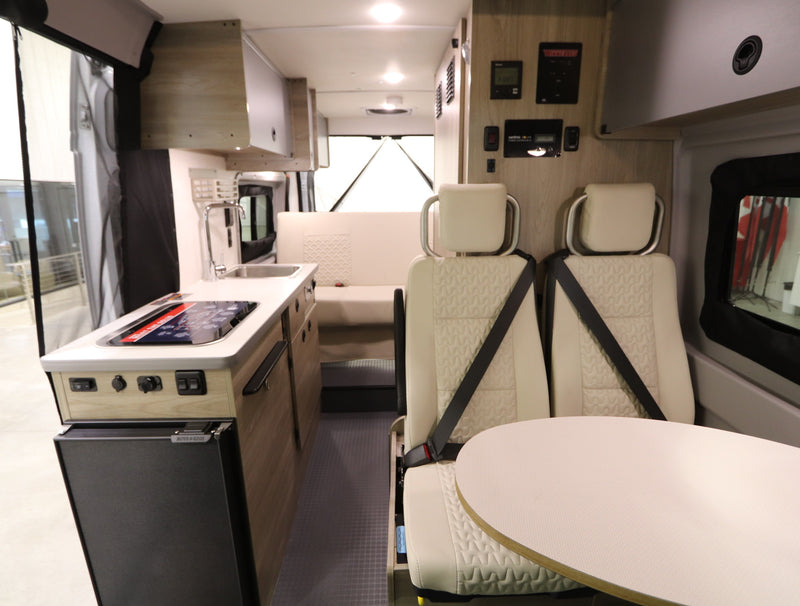  and storage. Ideal for travel.|Overhead view of a modern RV rental interior — photo 2