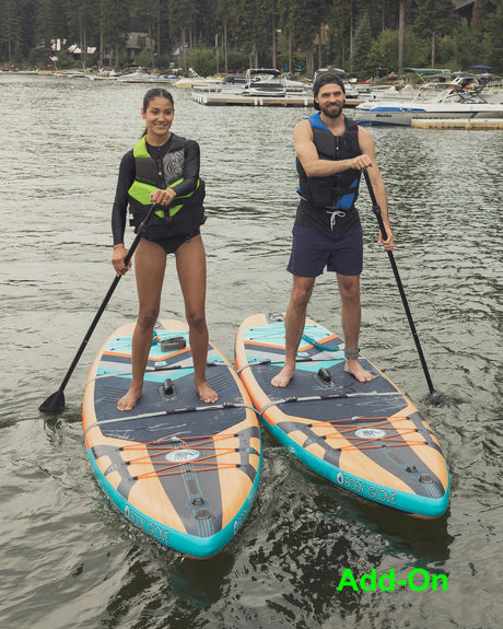 RV rental adventures often include lakeside fun like paddleboarding for two.