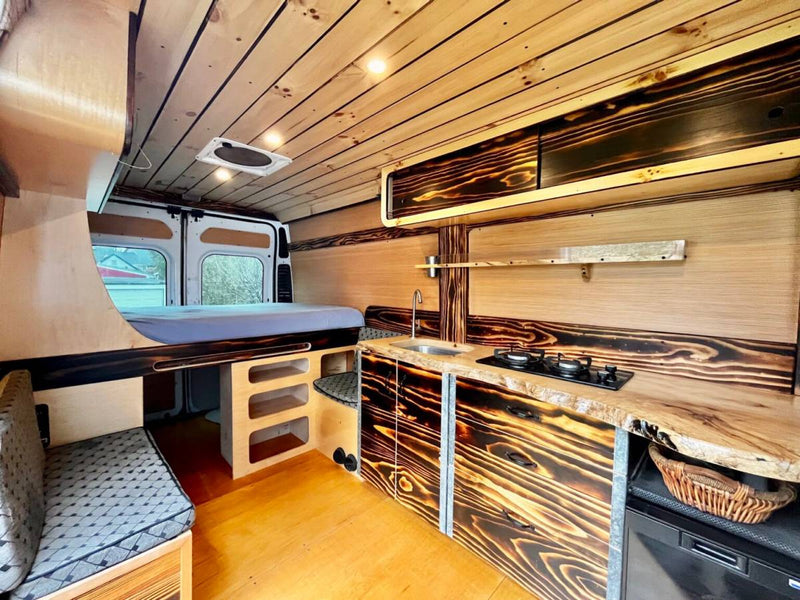 Beautiful custom wood camper van interior — photo 1