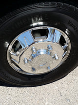 A new Continental tire and gleaming chrome wheel, ready for a reliable rv rental adventure on the road.