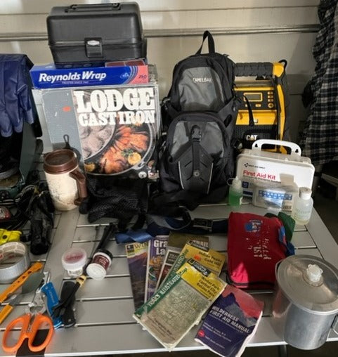 Essential gear for an RV rental trip: camping, first aid, maps, Lodge cast iron, power, & tools. Adventure awaits!