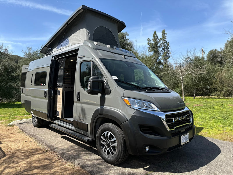A gray Winnebago Solis pop-top camper van — photo 1