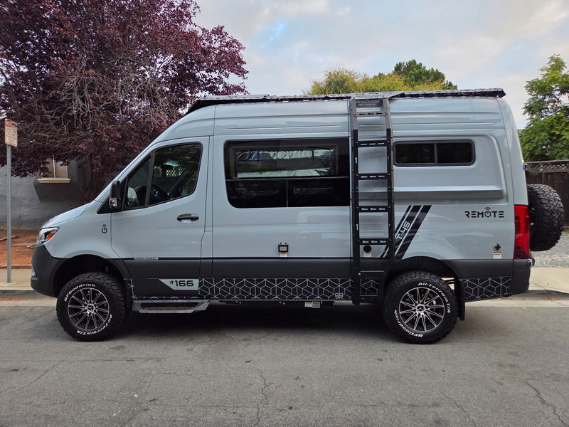  equipped for off-road adventures with solar and ladder.|This customized gray Mercedes Sprinter camper van — photo 2