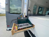 This rv rental has a pull-out Coleman propane stove with matches, ideal for convenient outdoor cooking.