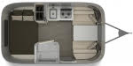  and a dinette table with bench seating.|Inside a modern RV rental — photo 9