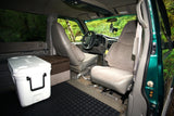 **RV rental interior:** This camper van offers comfortable seating, a cooler, and ample storage for your road trip.