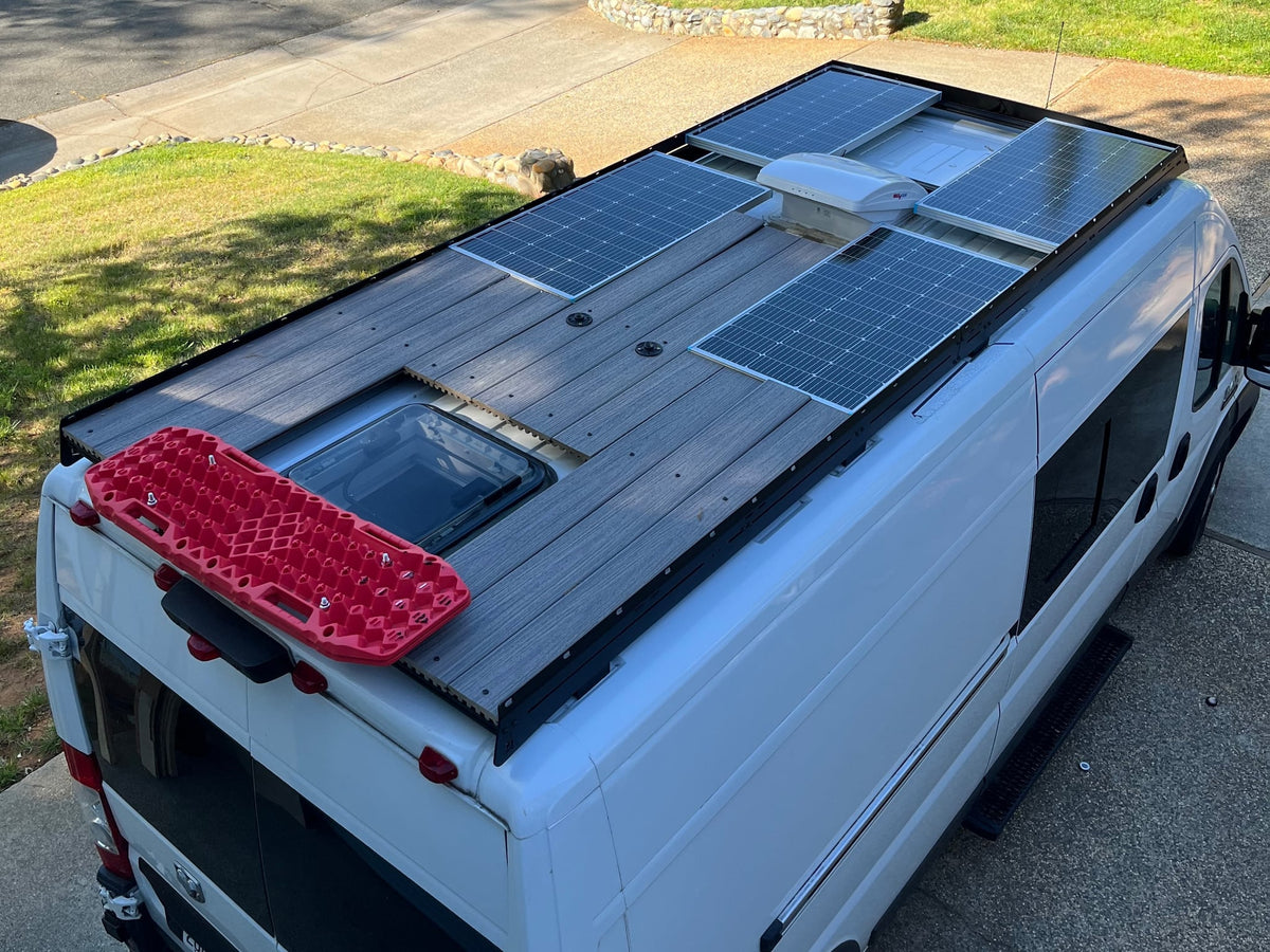  and a comfy bed.|Bright RV rental interior featuring a functional kitchen — photo 5