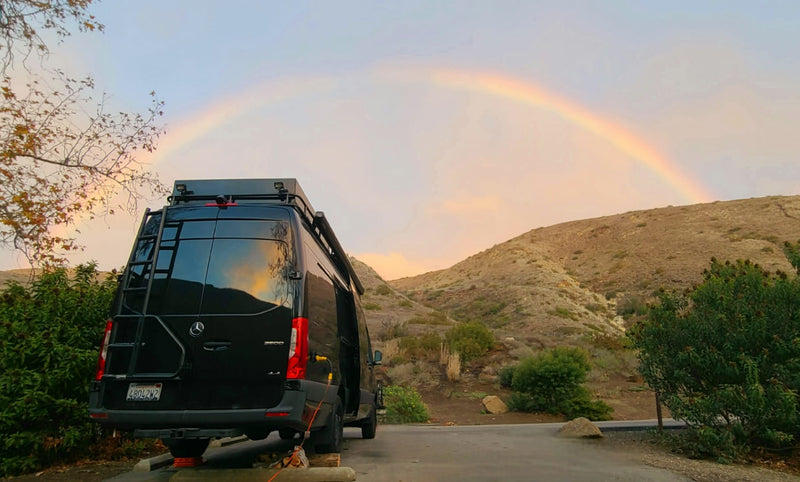  an ideal RV rental experience.|Stylish RV rental interior: featuring a custom wood kitchen — photo 4