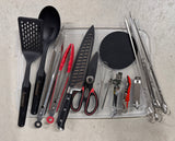 This RV rental essential kit includes diverse kitchen and grilling utensils: a spatula, spoon, tongs, knife, shears, whisk, openers, and skewers.